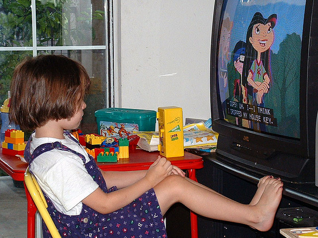 child watching television