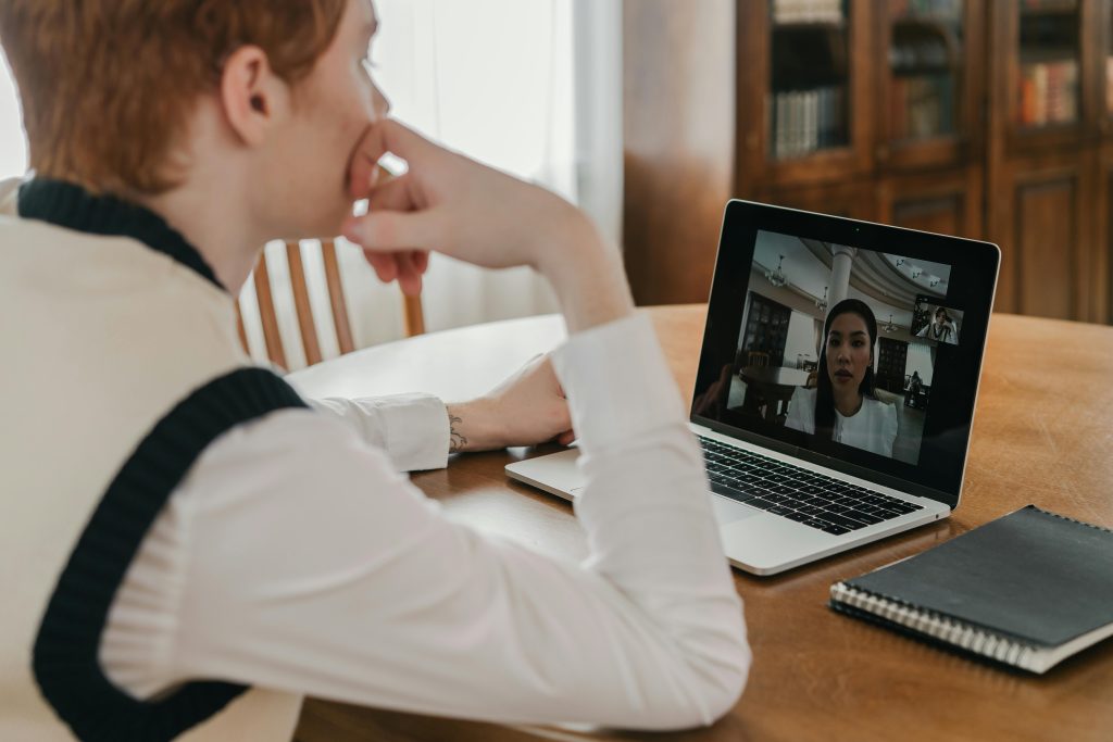 A Man Having a Video Call on His Laptop