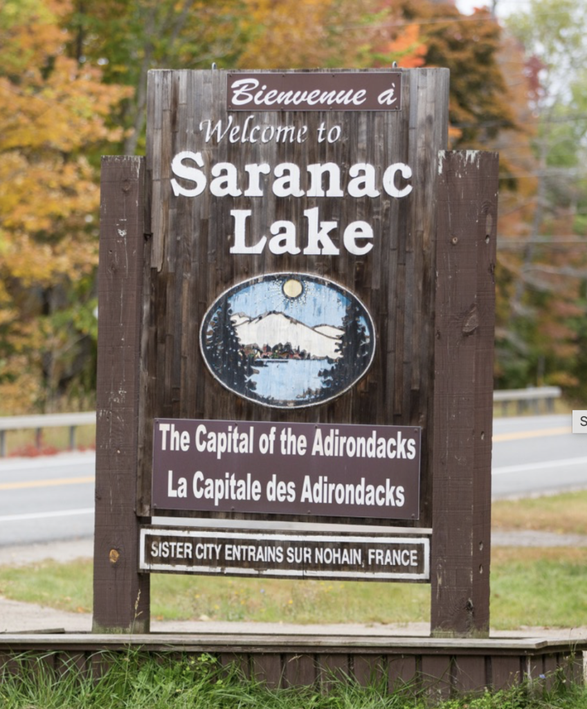 Sign entering Saranac Lake