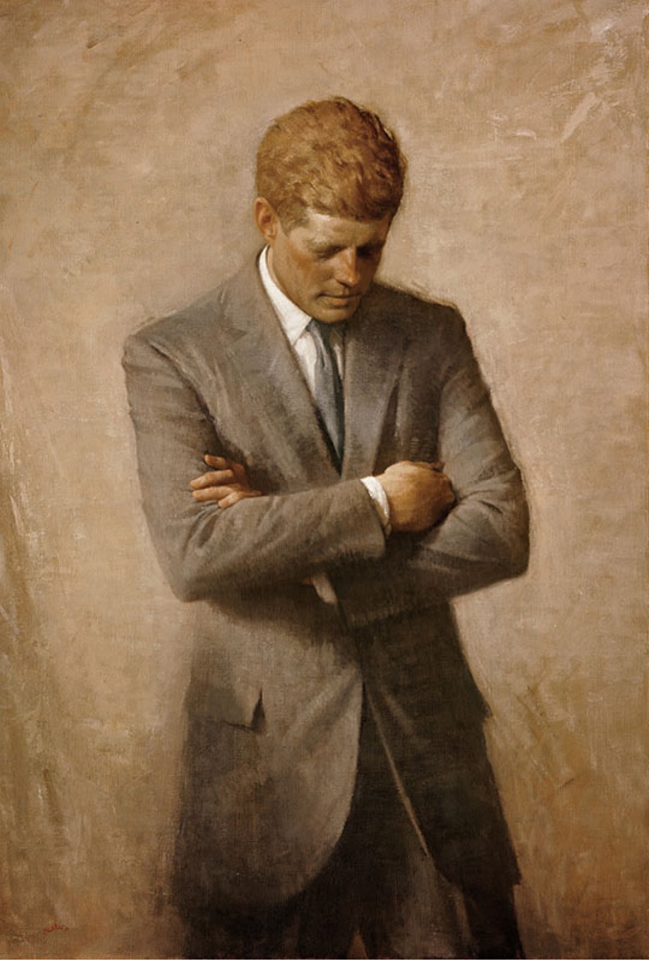 A portrait of John F. Kennedy depicts him from the waist up, standing with his arms crossed over his chest, gazing downwards with a contemplative or somber expression. He has reddish-brown hair and is wearing a light-colored suit jacket, a white shirt, and a dark tie. The background is a textured, light brown or beige color, giving the impression of an unfinished or abstracted wall. The overall style is painterly, with visible brushstrokes.