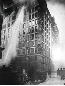 Photograph of firemen spraying water on the Triangle Shirtwaist Factory