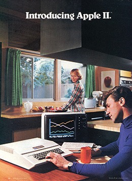 Advertisement for the Apple II computer showing a man working on the computer at a kitchen counter with charts displayed on the screen, while a woman is in the background preparing food.